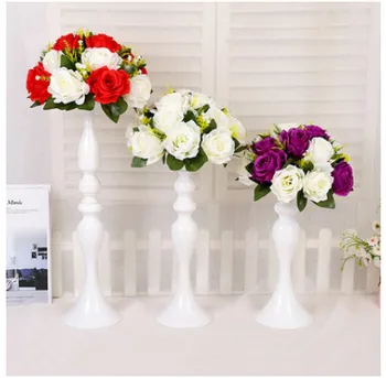 

Trumpet vase, wedding table, main table, white decoration, road, Candlestick, mermaid, venue, props and vases.