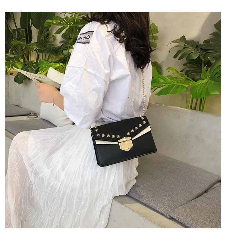 Retro rivet bag design sense lady bag clamshell PU leather lady crossbody bag chain bag new bag