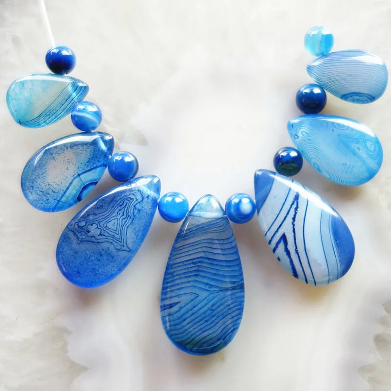 Бесплатная доставка интересно 7 шт. синий ониксовый камень Набор подвесок в форме