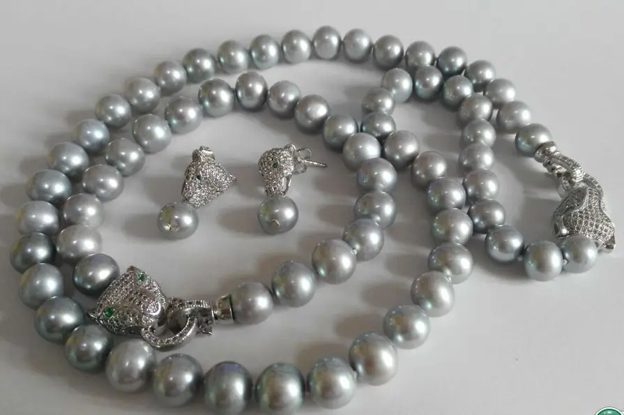 

Free Shipping >>>>> set of AAAround 9-10mm south sea silver grey pearl necklace& bracelet &earring