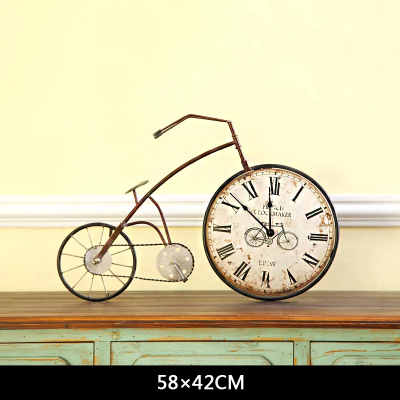 Retro bicicleta creativa colgante Reloj de pared decoración de sala de estar colgante reloj Vintage adornos personalidad decoración del hogar Accesorios Retro bicicleta creativa colgante Reloj de pared decoración de sala de estar colgante reloj Vintage adornos personalidad decoración del hogar Accesorios