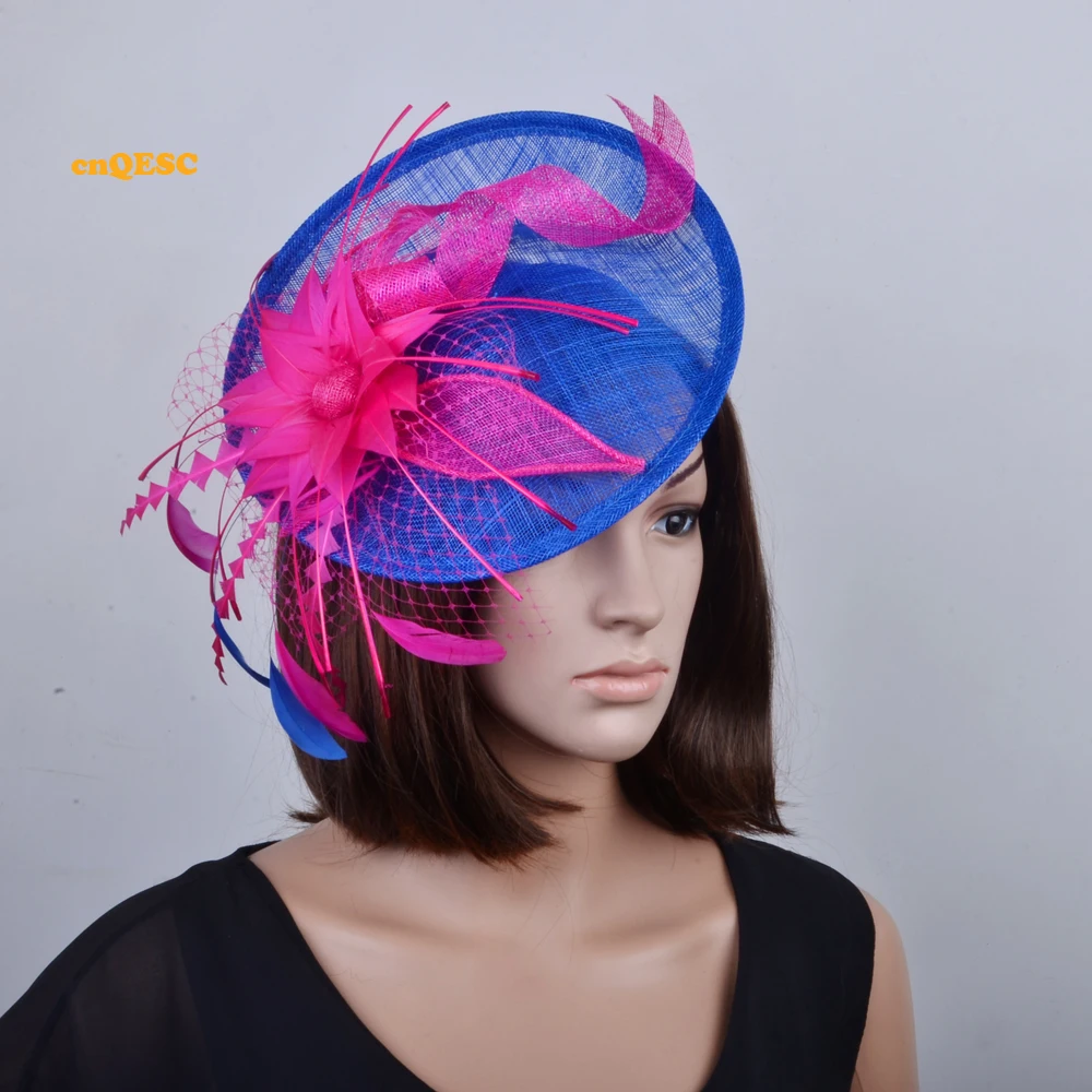 

Royal blue hot pink big sinamay fascinator with feathers for Tea Garden party Royal Races Kentucky derby.
