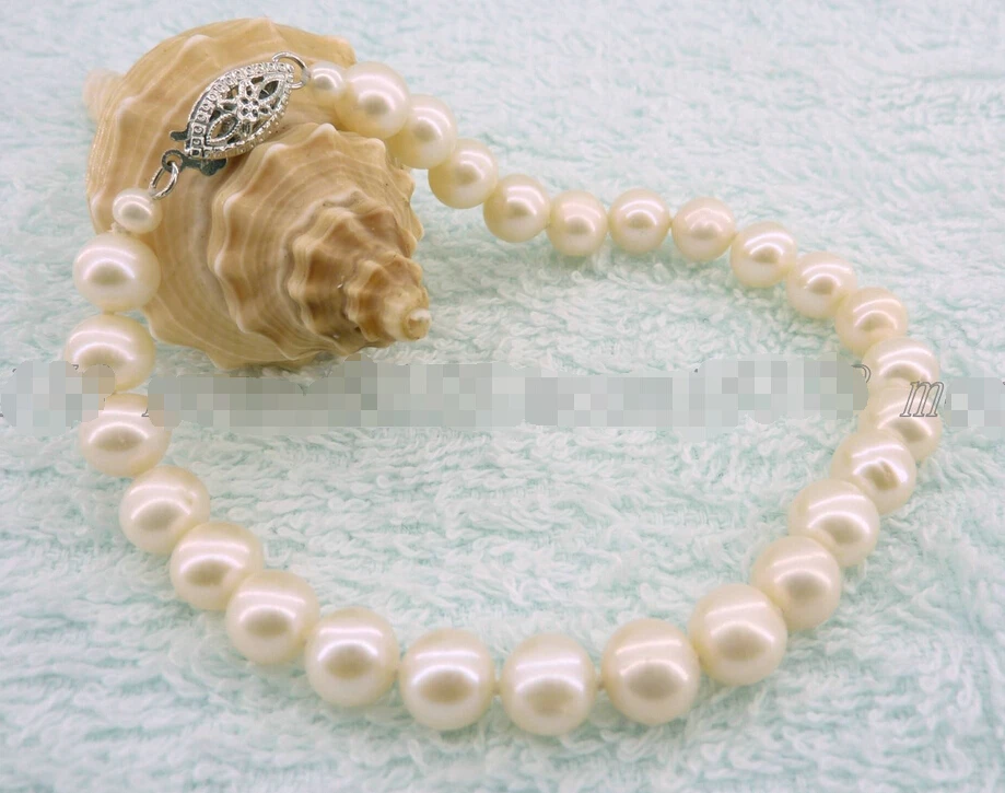 

FREE shipping>>>>cultured 7mm white aaa akoya genuine pearl bracelet 7.5" 14kt gold WG