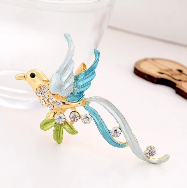 

Hesiod Cute Phoenix Pattern Brooch Wedding Party Dress Decor Delicate Crystal Birds Brooch Pins Gold Color Alloy Banquet Gifts