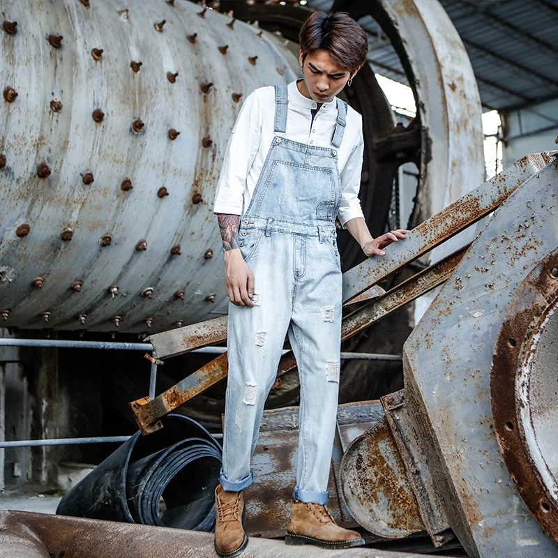 

2019 spring and autumn new jeans male Korean version washed white slim feet pants light blue staff dress bib pants Size S-6XL