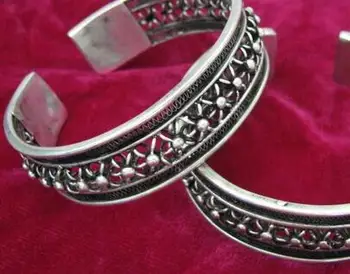 

Guizhou ethnic minority ornaments Miao hand-made seedlings silver jewelry Ancient law inherits traditional hollow silk flower br