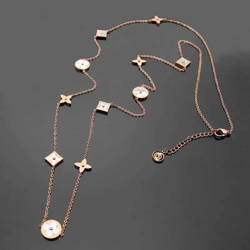 

Christmas gift extravagant brand top quality titanium steel necklace white shell long sweater chain eleven flowers Long Necklace