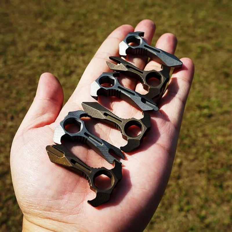 

Mini titanium alloy edc multi-tool, survival tool with keychain equipment, broken window rope wrench, screwdriver, bottle opener