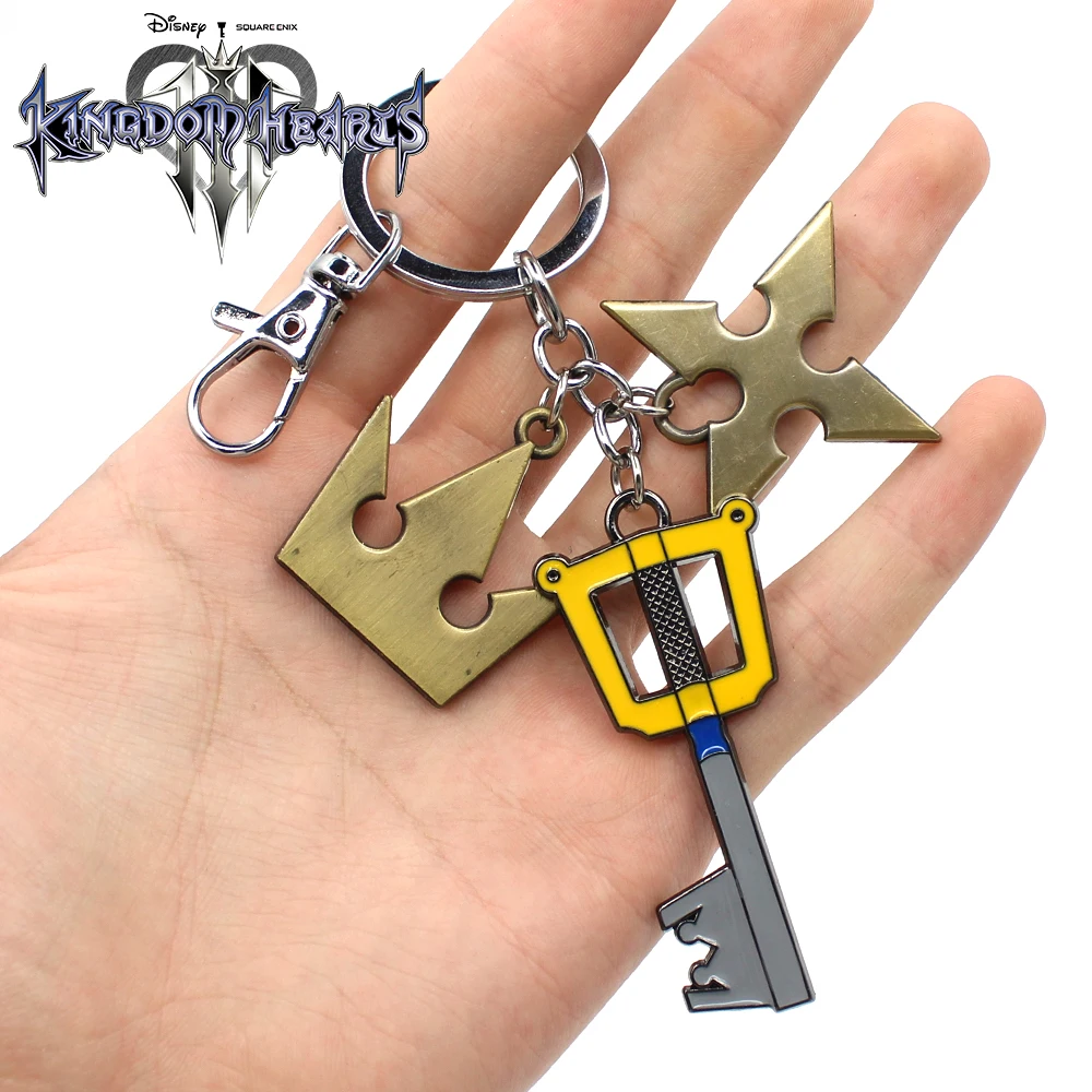 

Kingdom Hearts III Sora Keyblade key chains Weapon Gold Paopu Fruit Weapon Pendants Keychain Keyring Decor Ornament Accessories