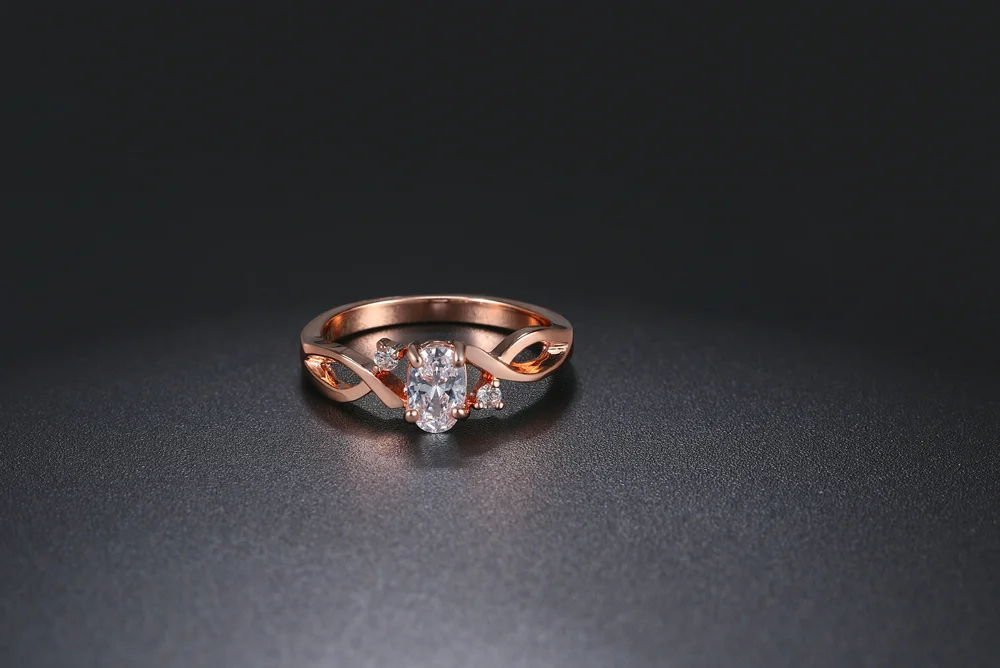 Модные спиральные женские кольца из розового золота для юбилея, инкрустированные овальным блестящим кубическим цирконием, ювелирные изделия, опт, DWR785