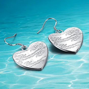 

Ms 925 sterling silver earrings. Korean pop earrings heart-shaped pendant. Engraving letters love of gift.Wholesale and retail