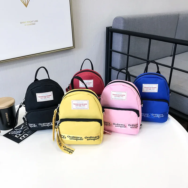 

Letter Printed Casual Canvas Backpack For Child Simple Mini Schoolbag Women Trend Shoulder Bag Crossbody Student Small Backpack