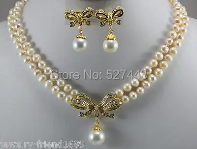 

Wholesale hot sale>>White cultured pearl necklace + bow pendant earrings