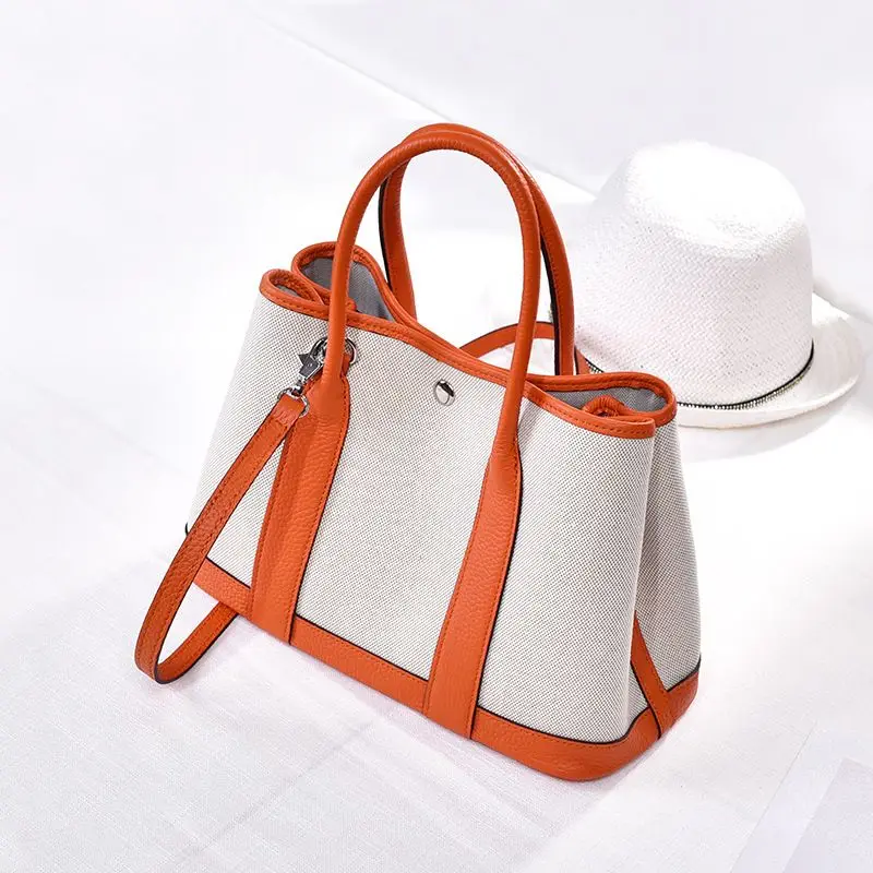 

LOEIL Leather canvas garden bag star with the contrast color crossbody shoulder bag female handbag mother