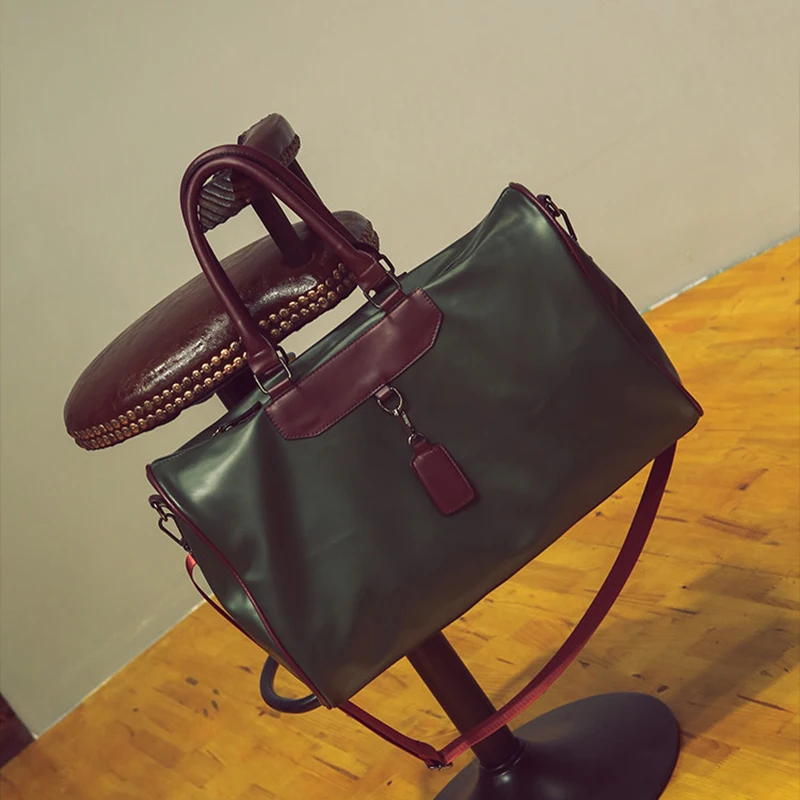 

2019 new Korean style loading and unloading handle handbag PU leather solid color large capacity shoulder Messenger bag