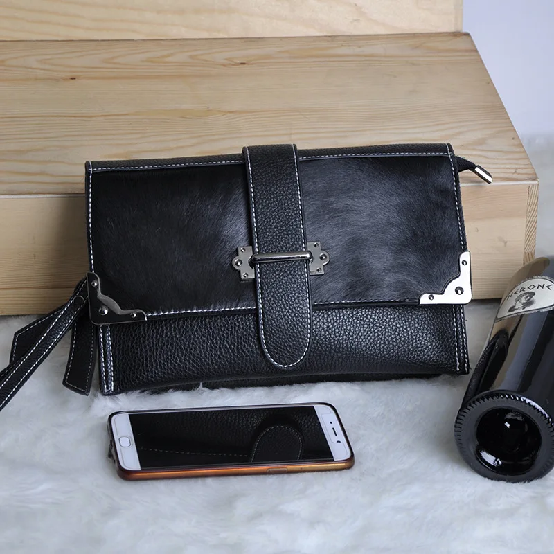 

The hot dinner hand clutch female big casual slung shoulder envelope bag hand bag