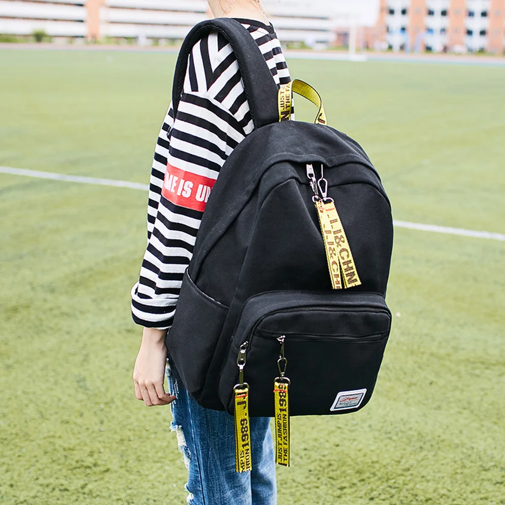 

New backpack female casual middle school schoolbag canvas solid color large capacity backpack