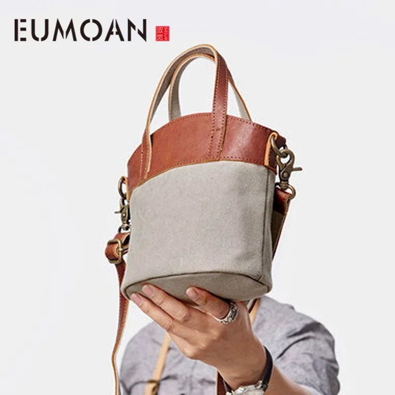 

EUMOAN Handbag female new bucket small bag Japan and South Korea version of literary canvas with leather Messenger bag