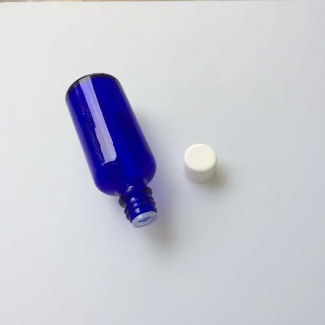 50ml Glass Skin Care Cream Bottles with White Cap Sealing up Packing Liquid Bottles Essential Oil Jars1