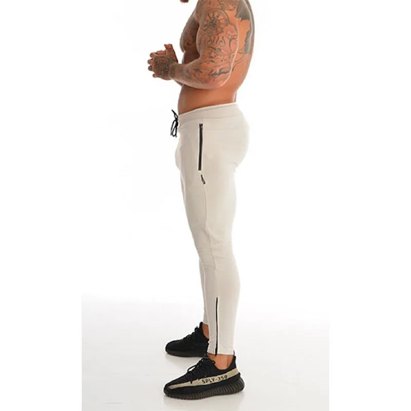 Мужские спортивные штаны, хлопковые мужские спортивные тренировочные штаны для фитнеса, повседневные модные спортивные штаны, высококачественные штаны для бега, обтягивающие брюки