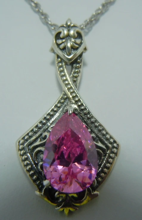 

The new 2014 zircon pink 2.5 CT teardrop-shaped ancient silver Contracted pattern 925 sterling silver pendant