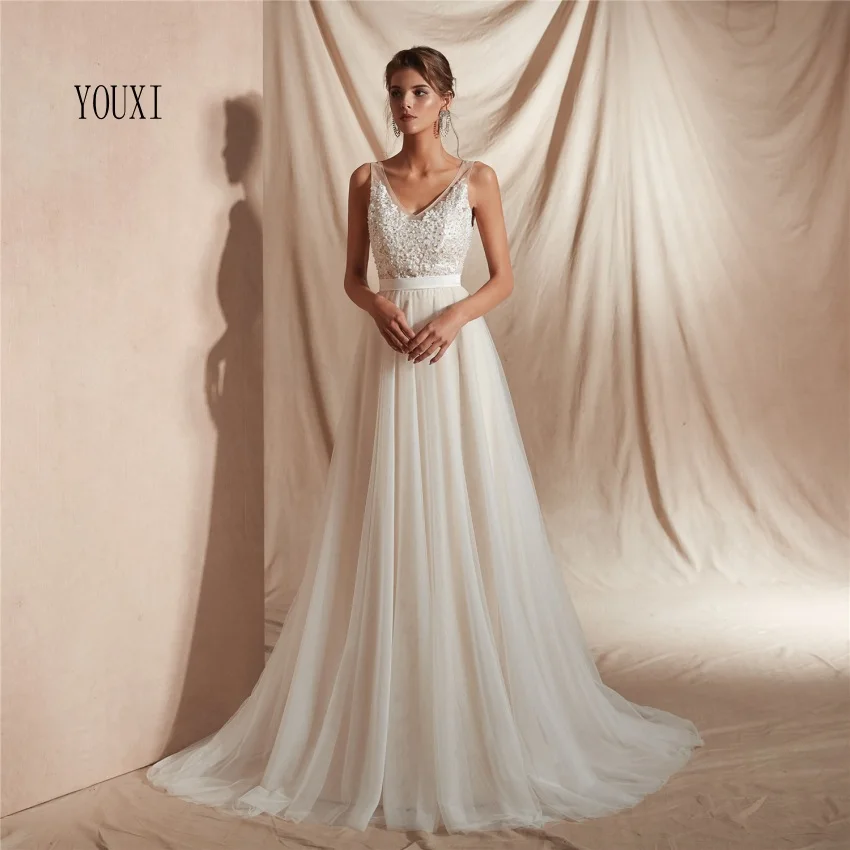 

Sexy V-Neck Appliques Lace Pearls Wedding Gowns 2019 Backless Ivory robe de mariage Beach Wedding Dresses