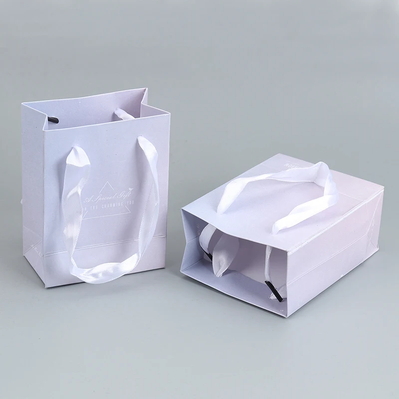 

5PCS/lot Purple kraft paper storage bag with handle wedding party gift bags with letters cloth shoes gift paper bags Wholesale