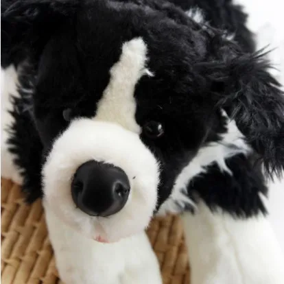 black and white stuffed dog toy