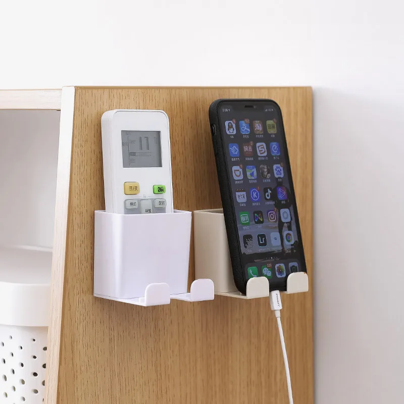 

1Pc New Mobile Phone Charging Stand Free Punching Power Cord Socket Hanger Wall-mounted Remote Control Storage Box