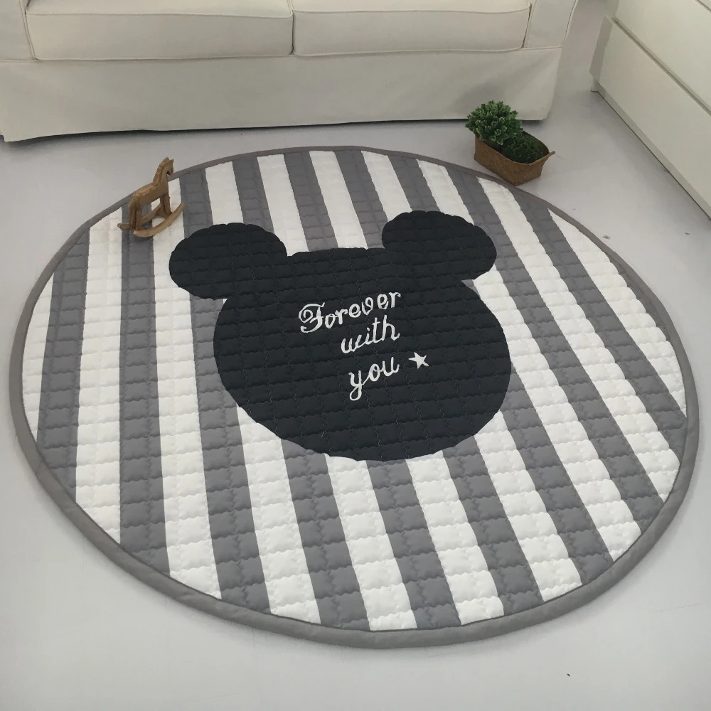 grey and white baby play mat