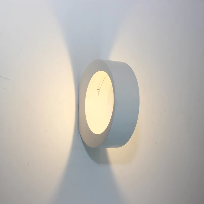 

European-style simple LED wall lamp round eccentric round indoor guest room lamp