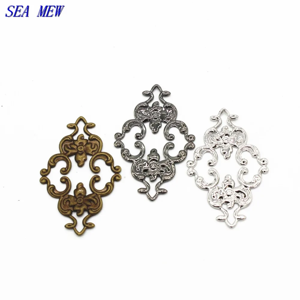 

SEA MEW 100PCS 23*36mm Copper Sheet 7 Colors Hollow Out Filigree Wraps Connectors Charm For Jewelry Making