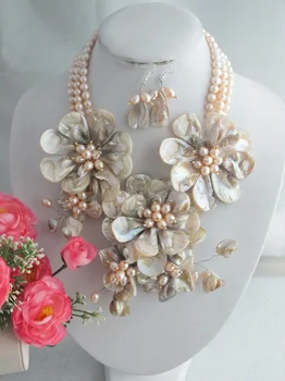 

Zoe Bride Ivie & GroomNigerian Wedding Makeup beads naija bride Shell beads Z-2372