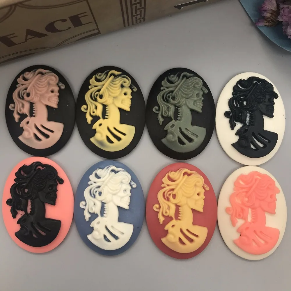 

Free shipping! Mixed colors. Lovely girl skull Cameo .Resin Flatback Cabochon for Necklace Pendant .jewelry.DIY , 30*40mm