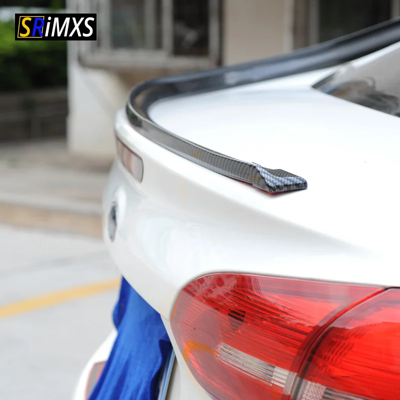 

Universal soft spoiler free punching carbon rubber tail spoiler PU carbon brazing DIY refit spoiler suitable for all type of car