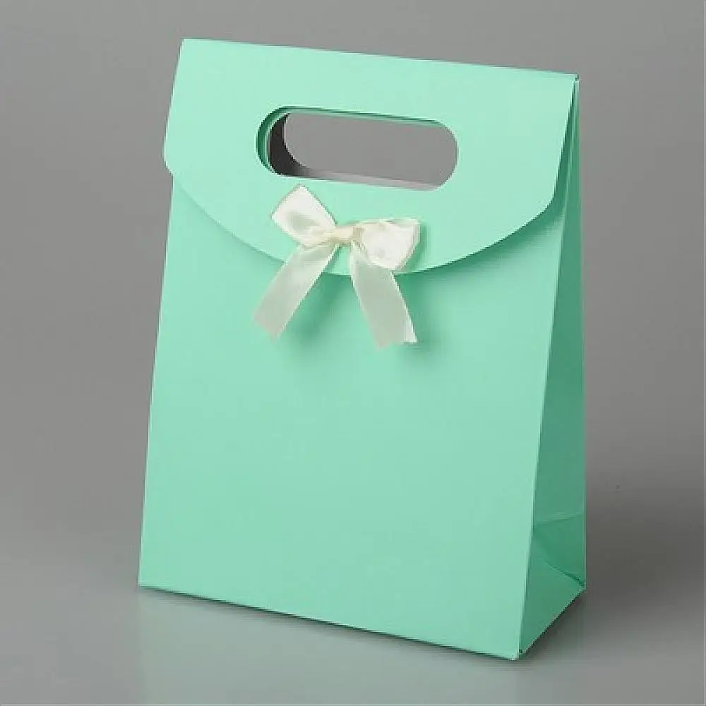 

Pandahall 60pcs Kraft Paper Carrier/Gift Bags with bowknot Packaging Gifts of Valentine's Day/Wedding/ Birthday 12.3*16.3cm