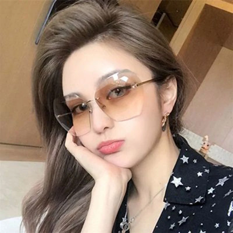 

New marine film sunglasses outdoor glasses fashion sunglasses men and women frameless metal sunglasses
