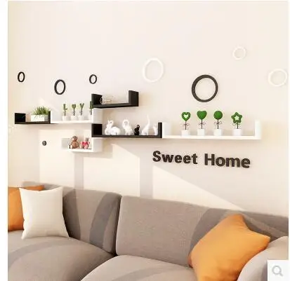 

The wall shelf sitting room wall hanging wall partition is put aside multi-layer shelves from punching contracted and contempo