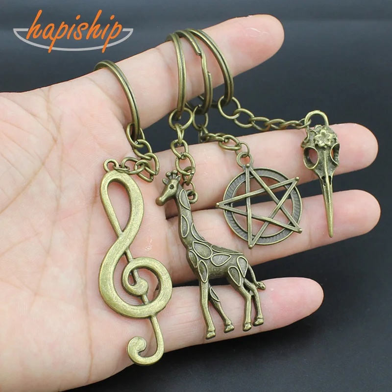 

Hapiship 2018 Top Hot Handmade Vintage Bronze Scissors Giraffe Star Key Chains Key Rings Alloy Charms Gifts YS4678