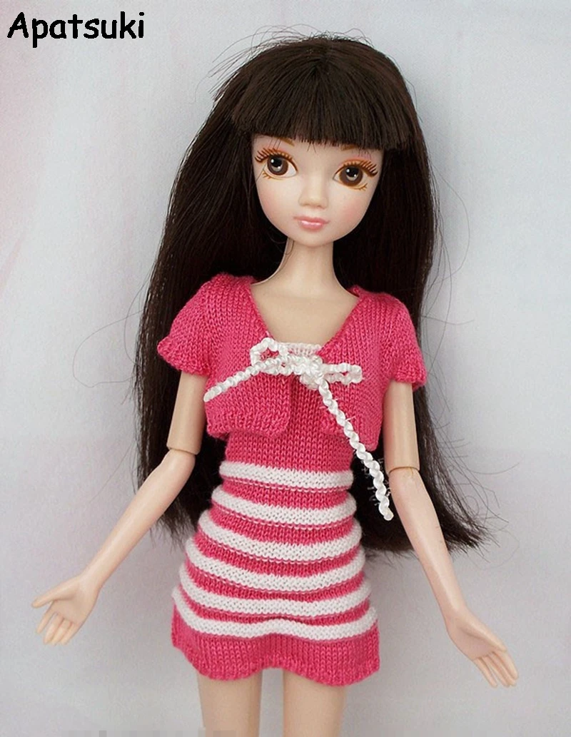 barbie doll house and dresses