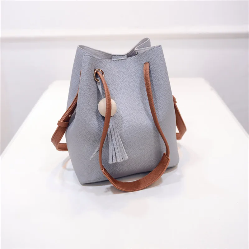 YBYT brand 2017 new small joker leisure tassel solid bucket package hotsale women shopping handbags lady shoulder crossbody bags