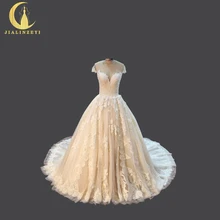 JIALINZEYI Sexy Short Sleeves nude Lace Appliques High Quality Sexy Back Bridal Wedding Dresses Wedding Gown 2018