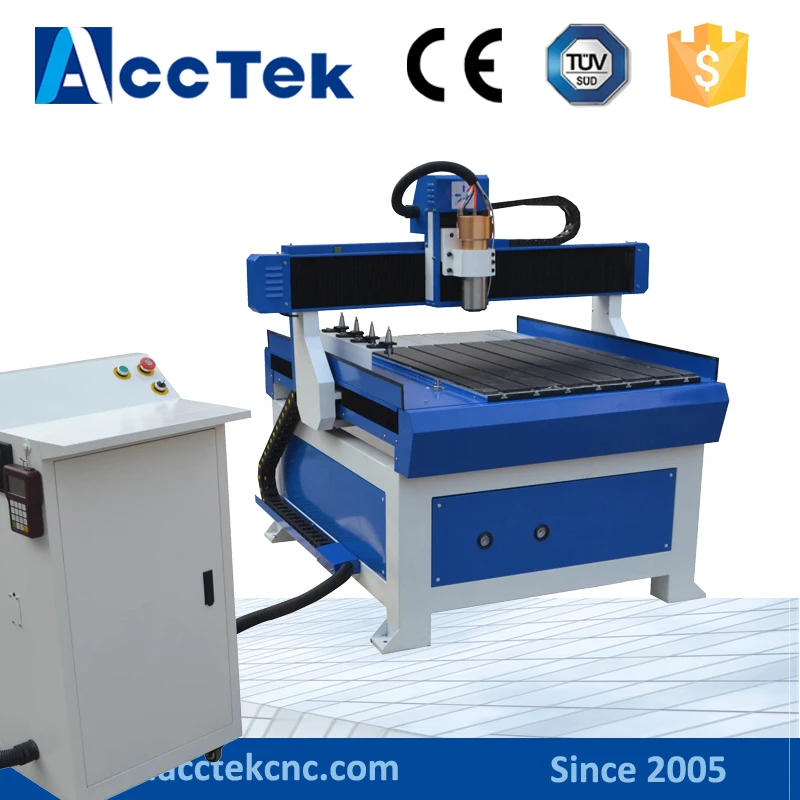 

3d wood cutting cnc machineAKM6090 1.5KW water cooled spindle cnc wood cutting machine vacuum table/T-slot table