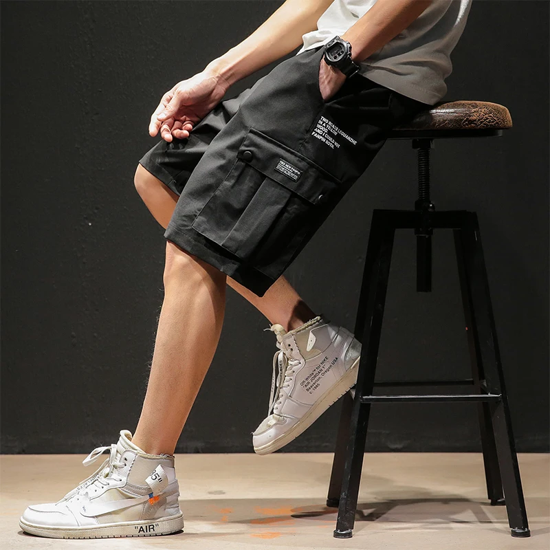 

High quality Men's shorts Polyester loose size 5XL multi pocket cargo shorts men Hip hop jogging black grey summer men shorts 63