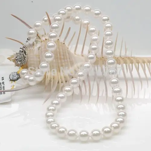 

FREE SHIPPING>@@> wholesale Natural 18" Rare 10-11mm AAA+ white Round pearl necklace