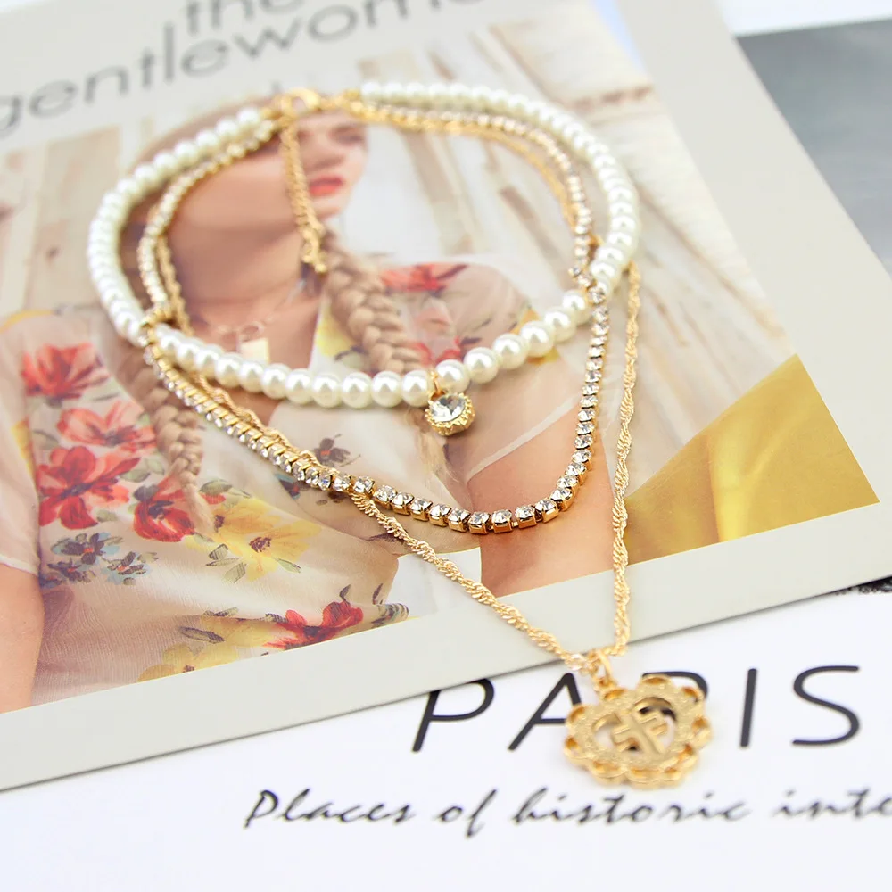 

TOUCHEART 2019 Pearls Layered Choker Necklace&Pendants For Women Heart&Cross Necklace Charm Christian Jewelry Necklace SNE190077