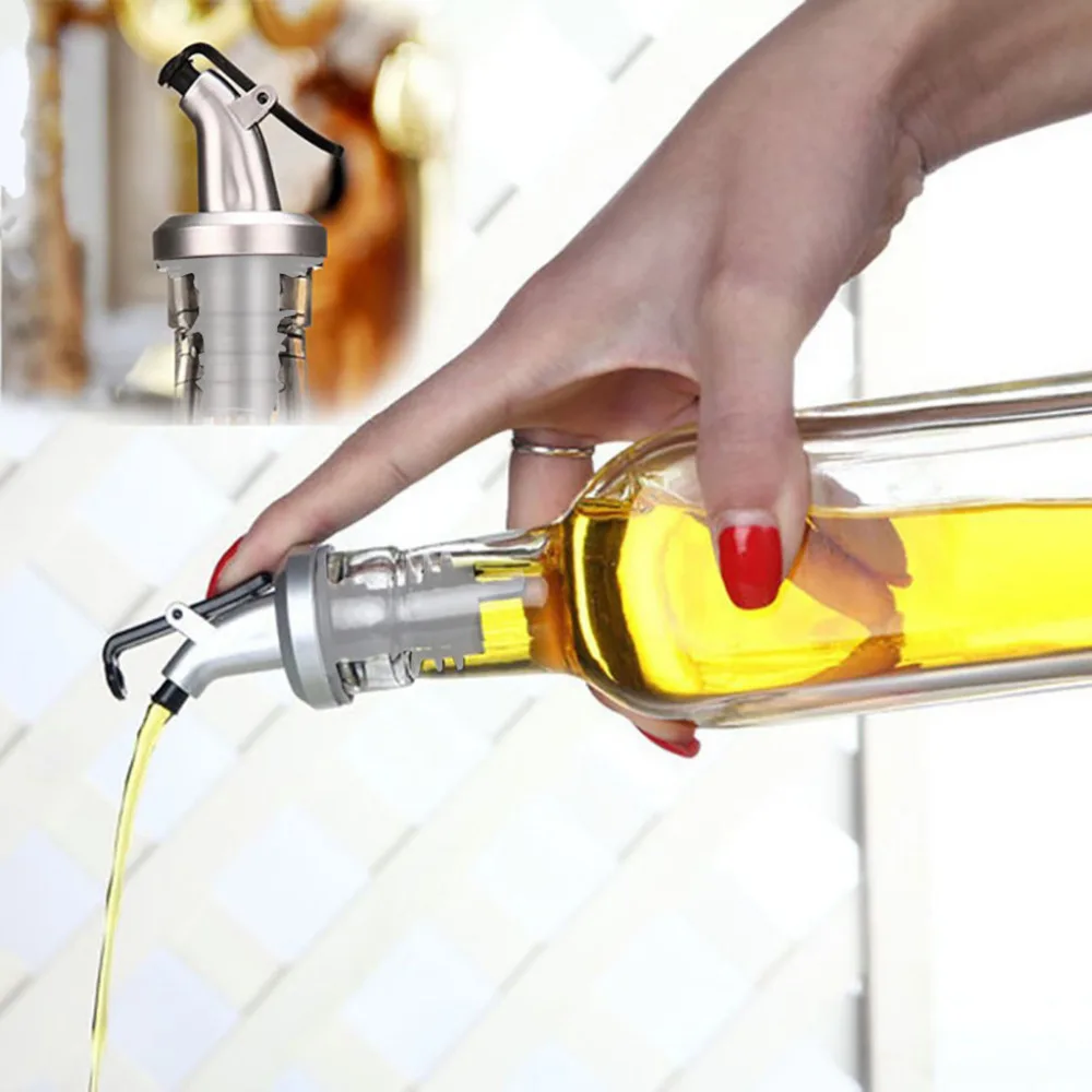 

2019 New High Quality Olive Oil Sprayer Liquor Dispenser Food Grade Rubber Wine Pourers Flip Top Stopper Kitchen Tools 19FEB21