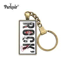 Фотография Rolling Stones Rock Band Keychain Glass Cabochon Music Rock And Roll Key Chains Glass Dome Key Ring Jewelry Key Holder