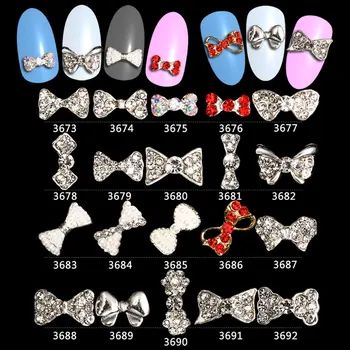 

wholesale -100PCS/Lot AAA high quality strass Cute Shinny Rhinestone Metal Nail Art 3d Charms Deco Bows pearl bow-3673-3692