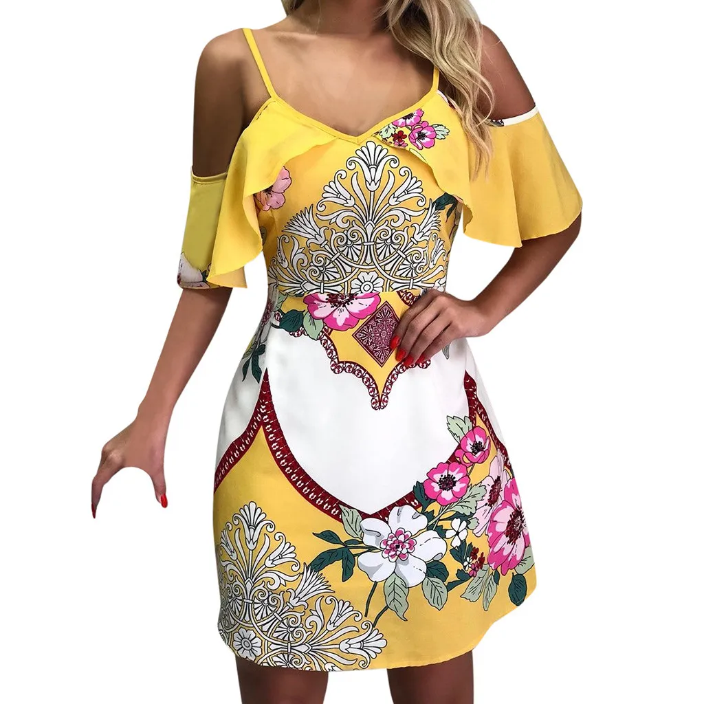 dress with small shoulder straps worn in summer